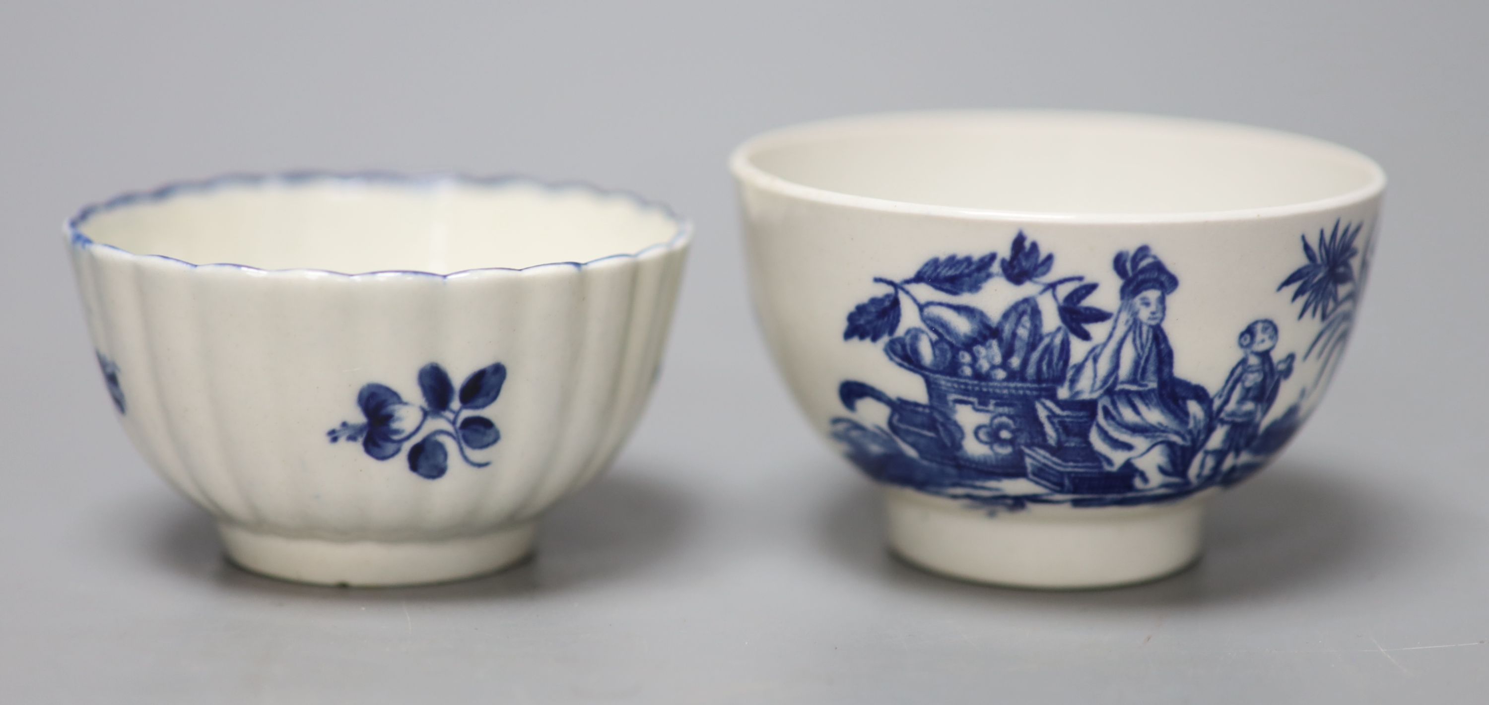 An 18th century Worcester teabowl and saucer Gilliflower pattern and another with mother and child pattern, all with crescent marks